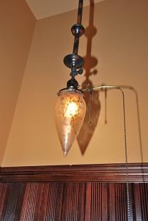 Light fixture above utility sink